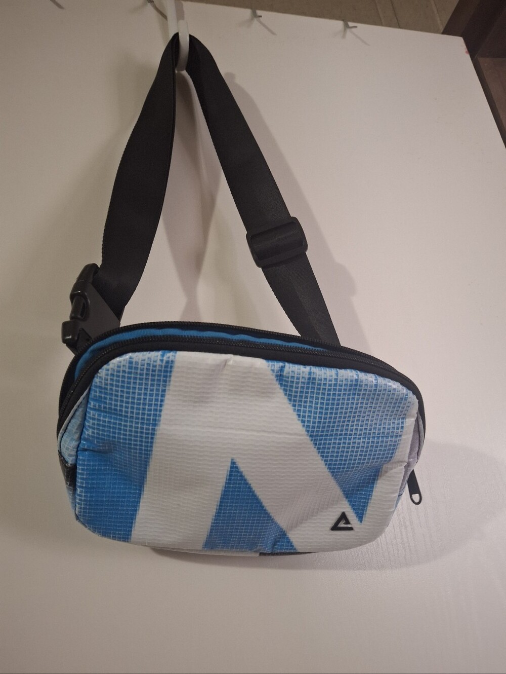 Blue and White Unisex Crossbody Bag by Rareform